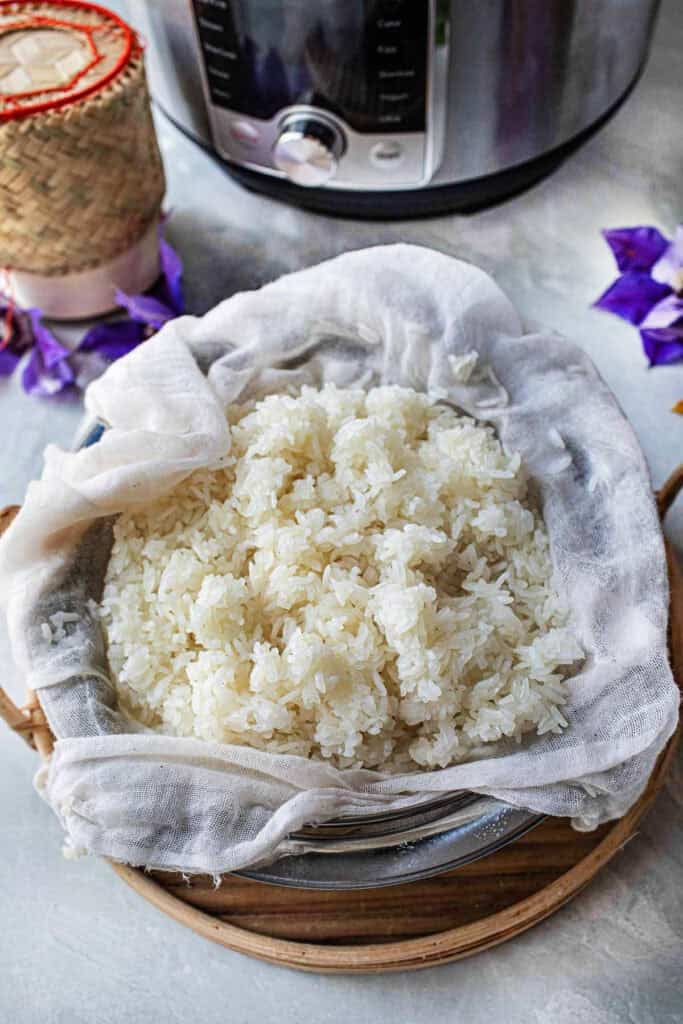 Thai sticky rice in a cheesecloth in a  basket.