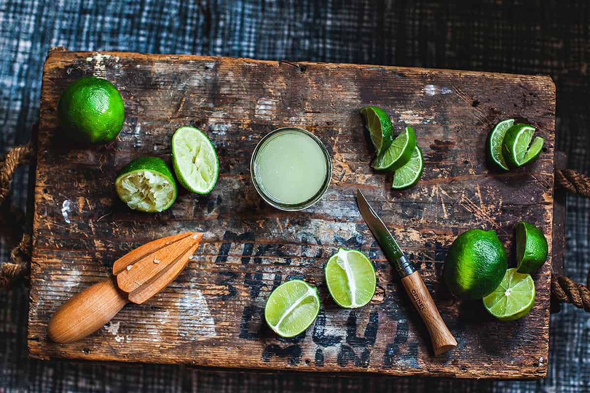 Lime juice on a cutting board.