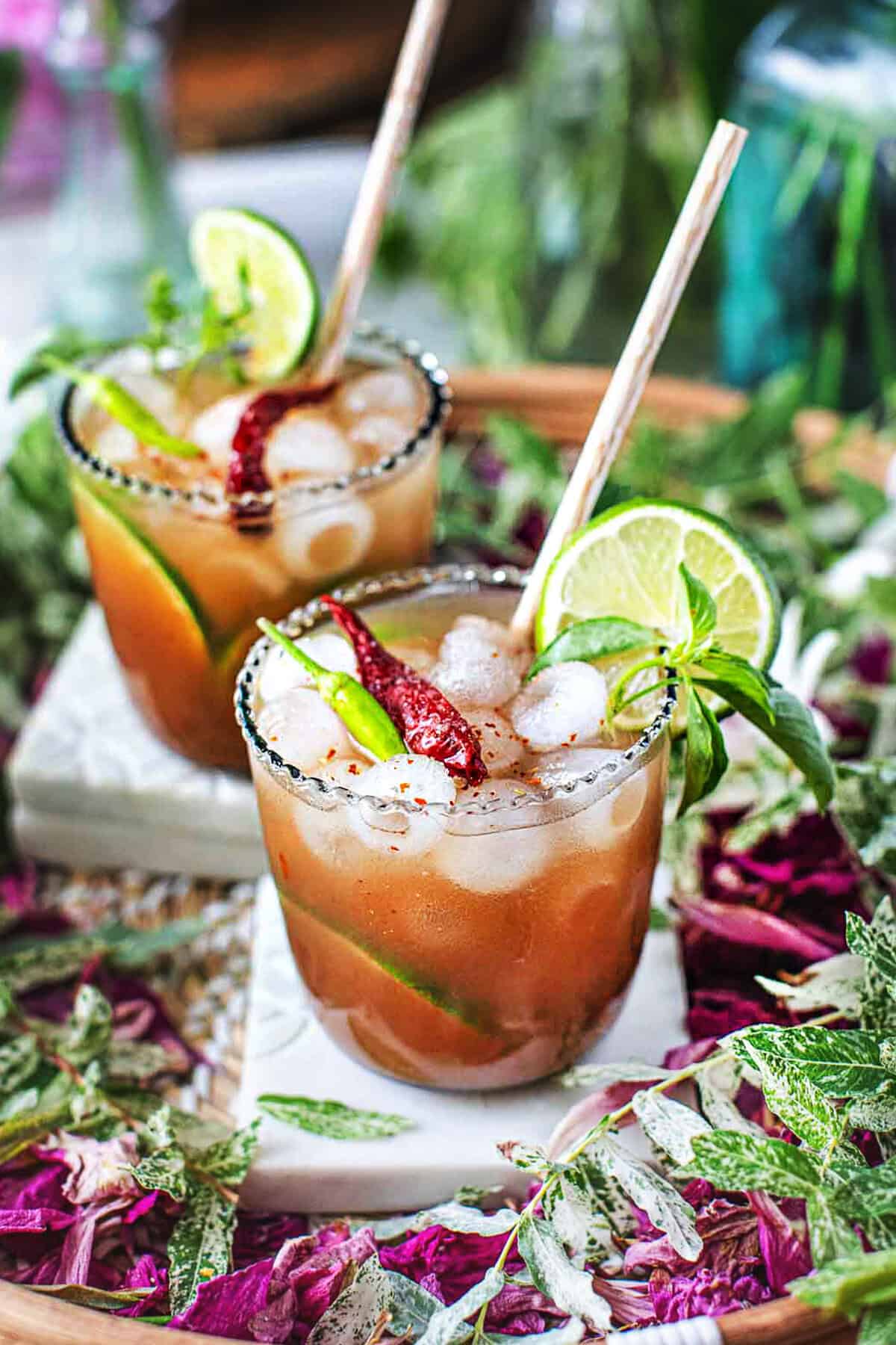 Spicy tamarind cocktail in glases on the table. 