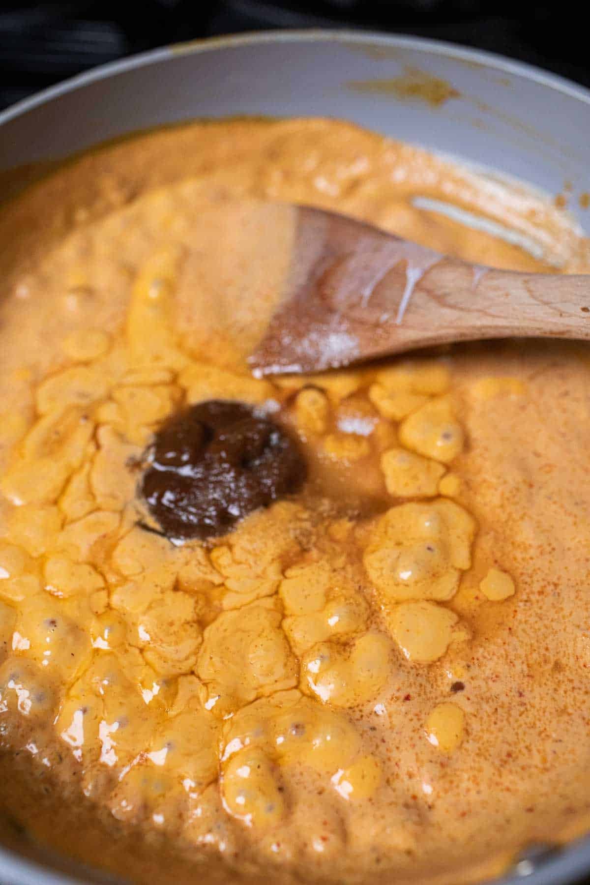 tamarind in rama sauce in a skillet. 