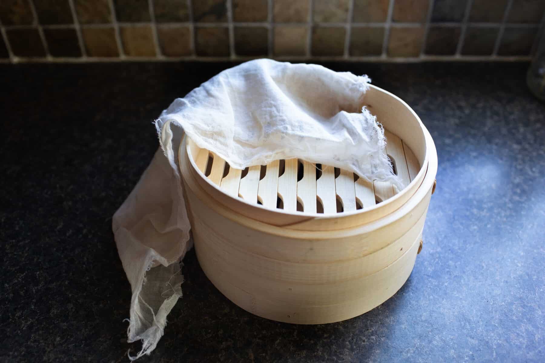 Bamboo steamer on the counter. 