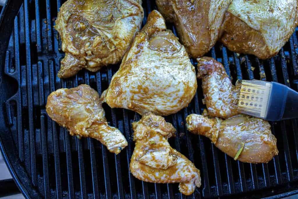 Grilled chicken on a grill. 