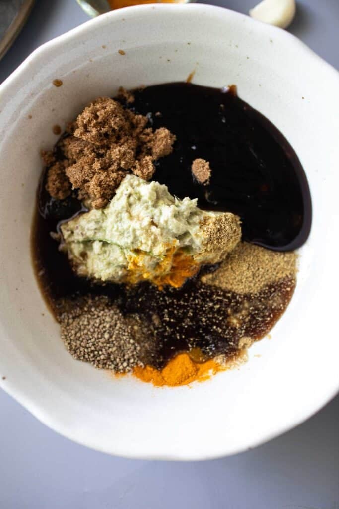 Gai Yang marinating ingredients in a bowl.