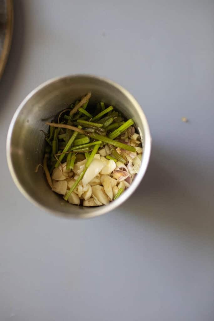 Gai Yang marinating sauce in a spice grinder.