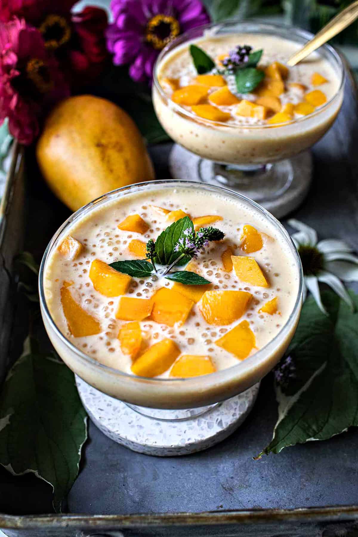 Mango tapioca pudding in a glass.