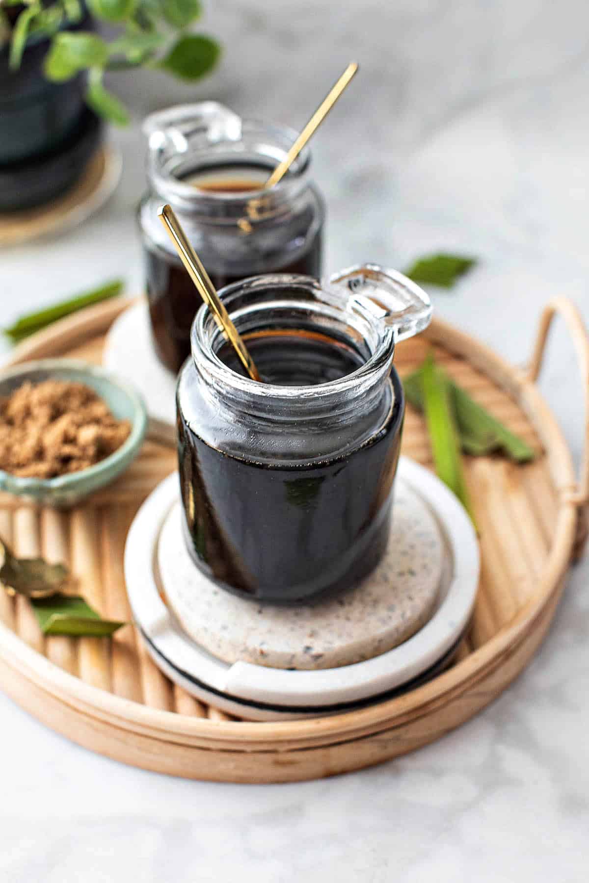 Brown sugar simple syrup in a glass jars. 