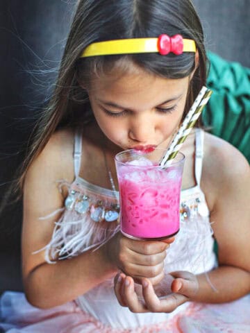 Extra cute girl holding pink drink. (;