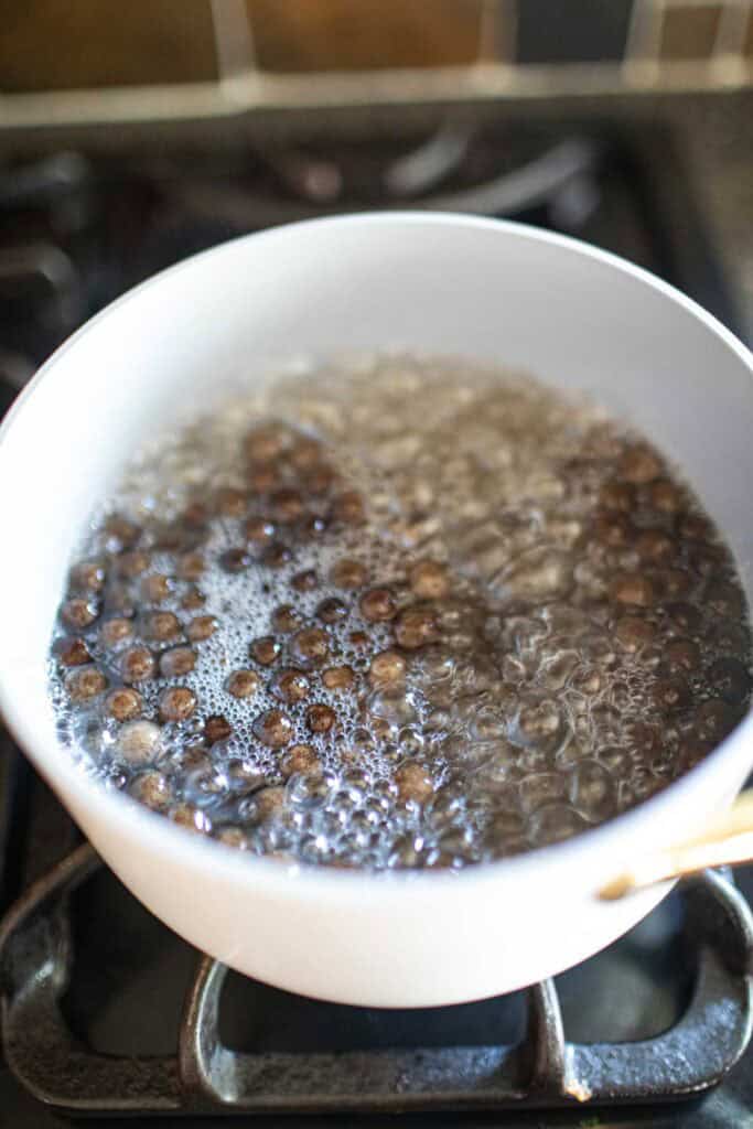 Tapioca pearls cooking in a pot