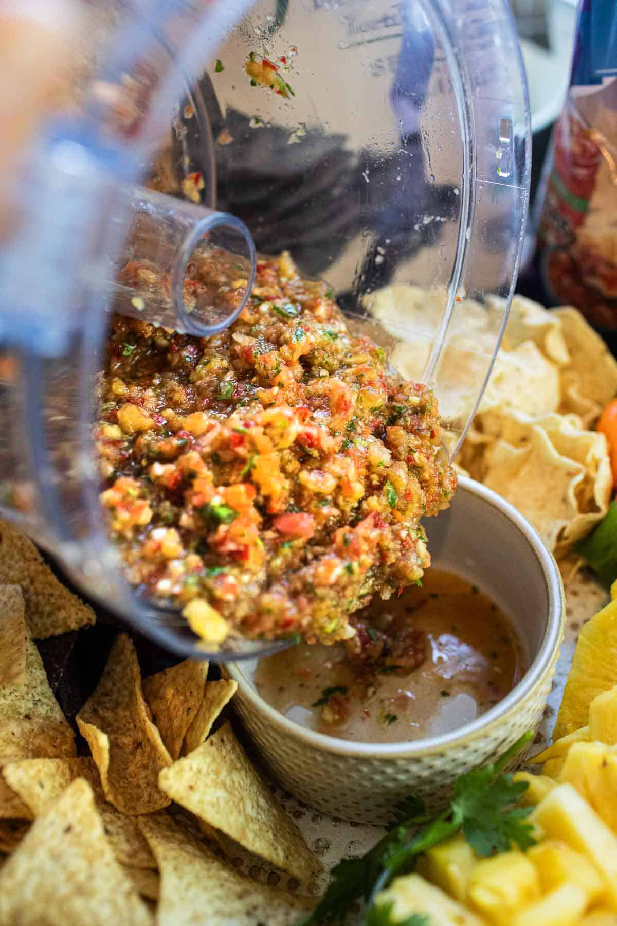 Habanero Pineapple sauce  pouring into a bowl.