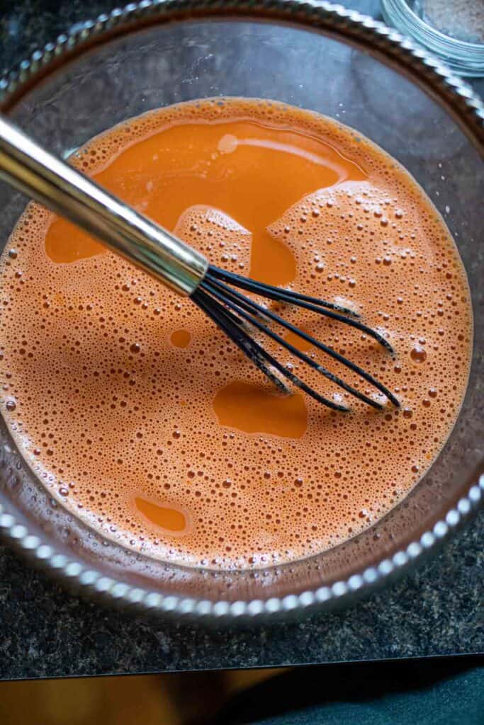 Thai ice tea in a glass bowl. 