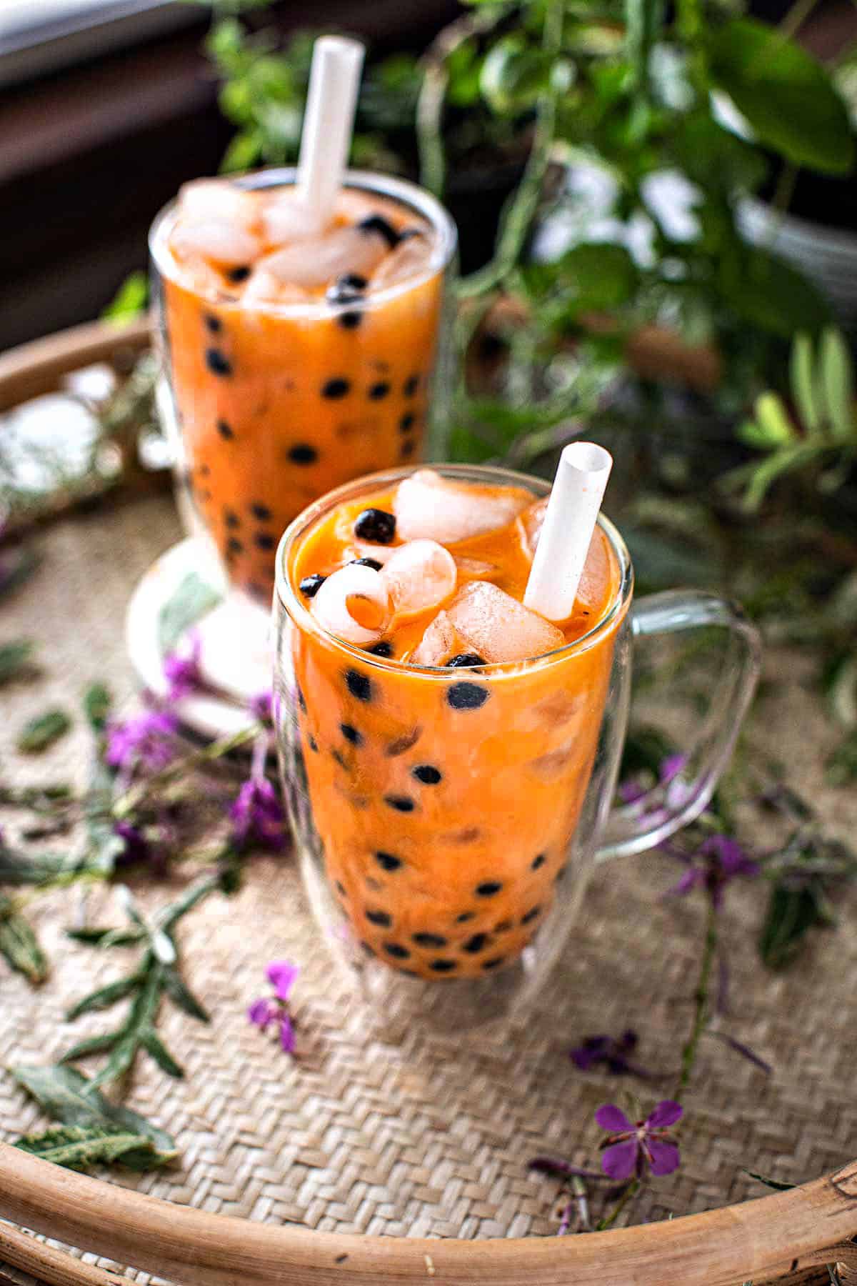 Thai bubble tea in a glass with straw. 