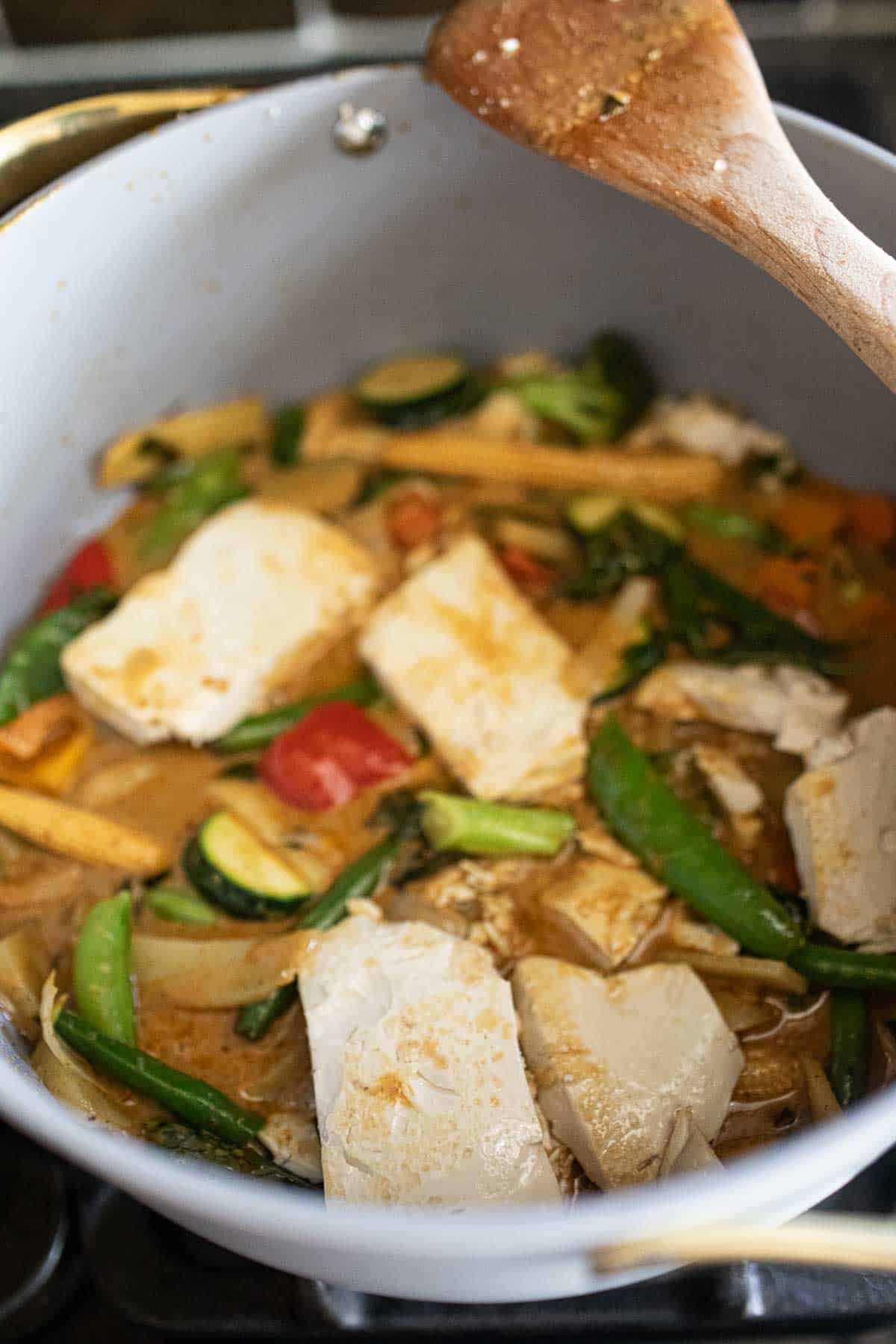 Thai vegetarian curry with tofu in a pot. 