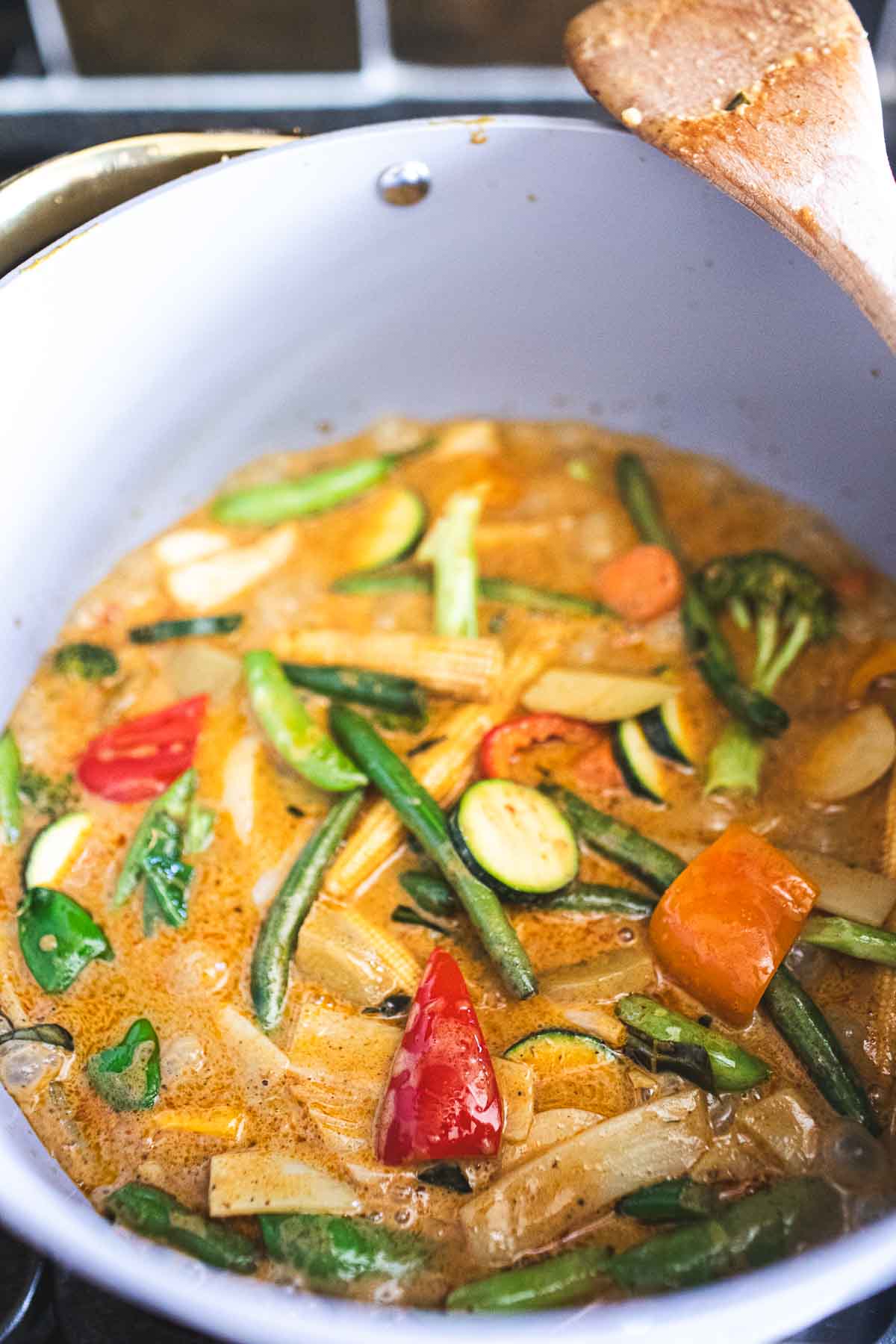 Thai yellow curry with veggies in a pot. 