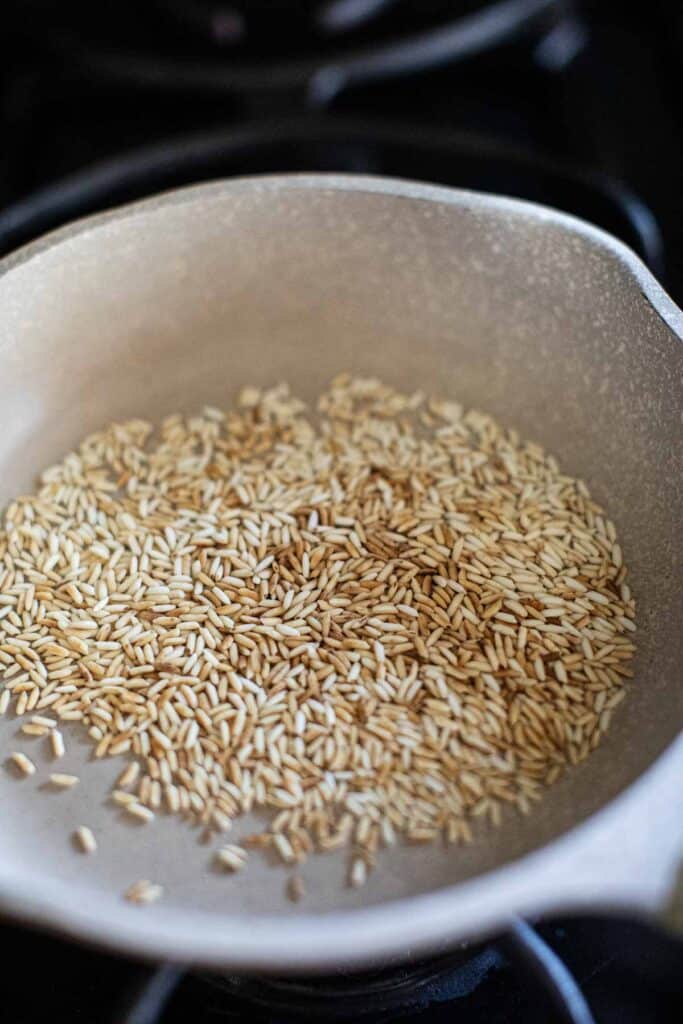 Toasted rice in a pan.