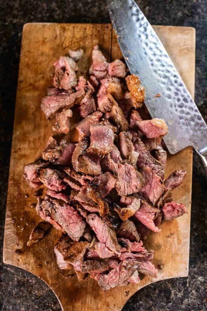 Sliced Beef on a cutting board. 