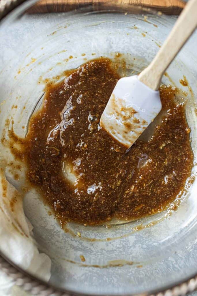 Thai Pork garlic marinating sauce in a glass bowl. 