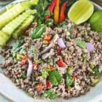 Authentic Beef Laab in a platter with ground beef and herbs.