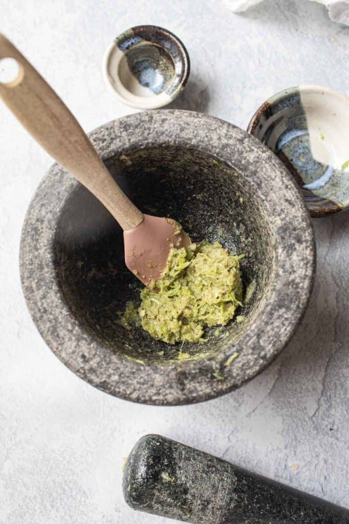 Thai classic paste in a mortar on table. 