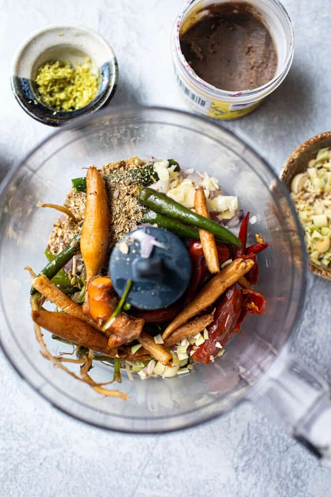 jungle curry ingredients in a food processor.