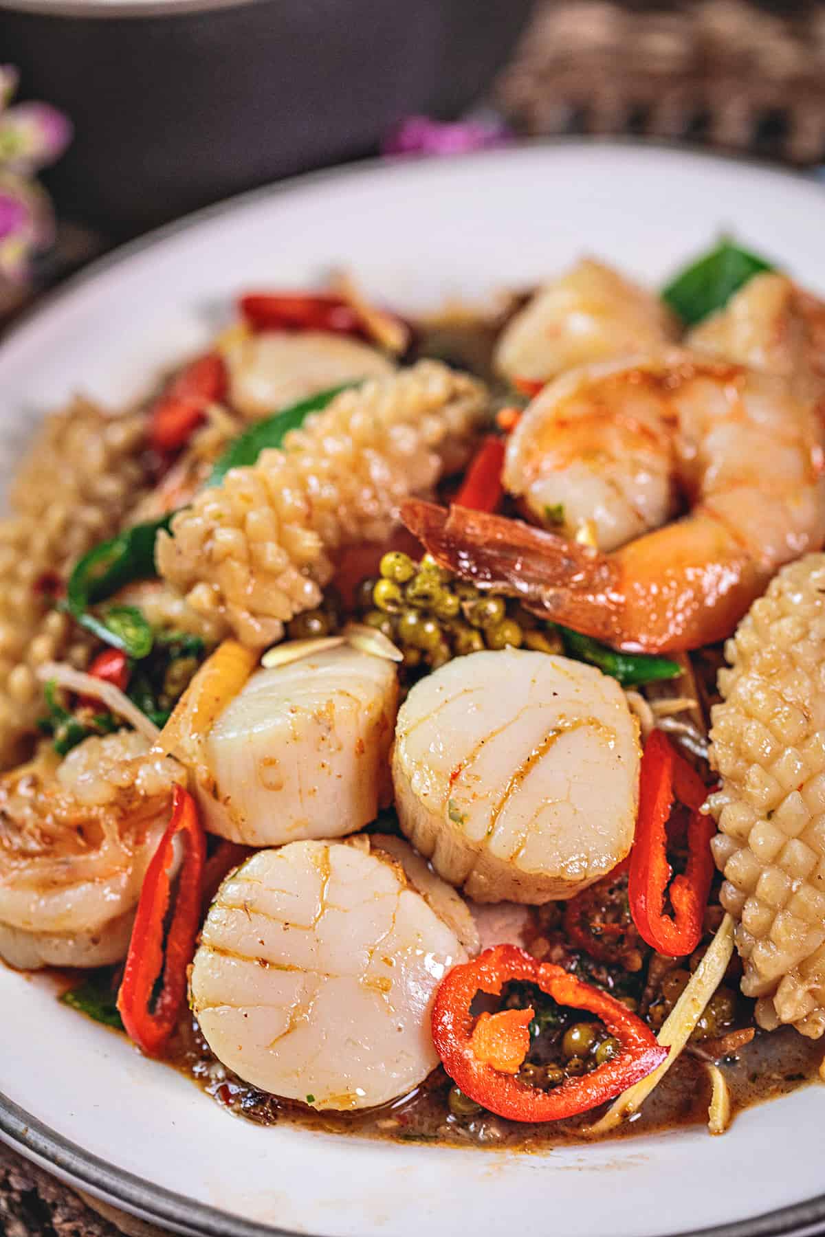 Seafood Pad Cha stir fry on a white plate. 