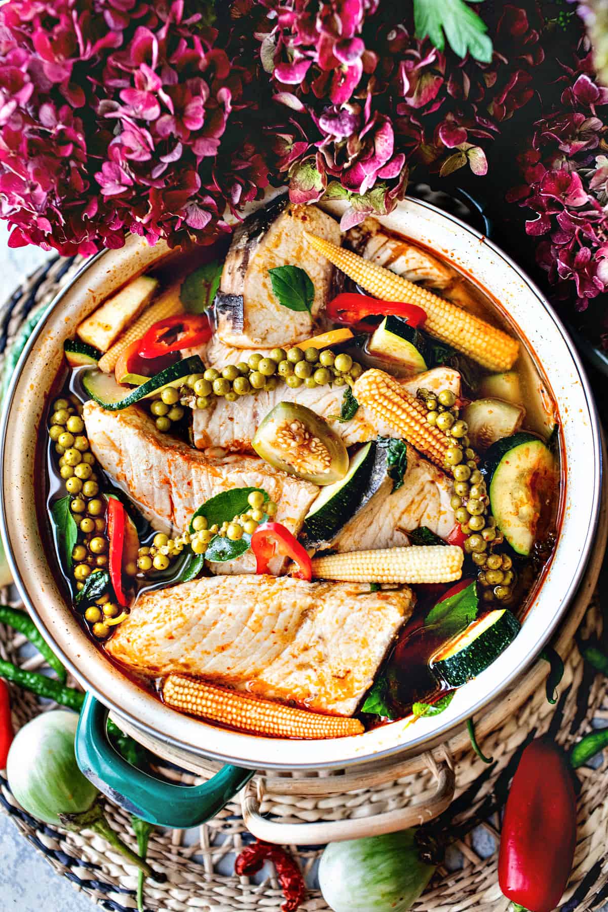Fish jungle curry in a bowl on the table.