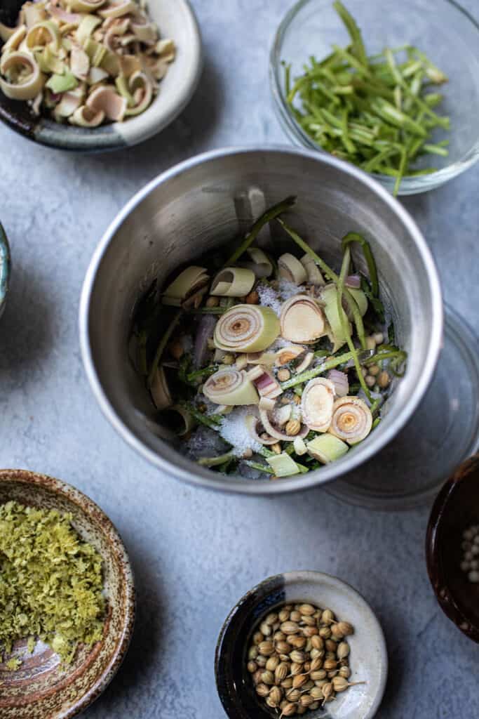 Tom kha paste herbs in a spice grinder.