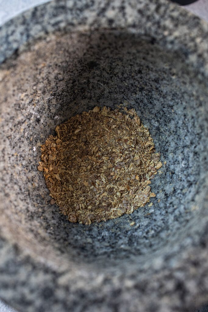 Ground spices in a mortar.