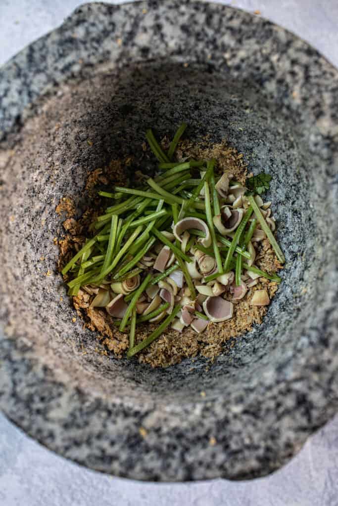 Ground herbs in a mortar.