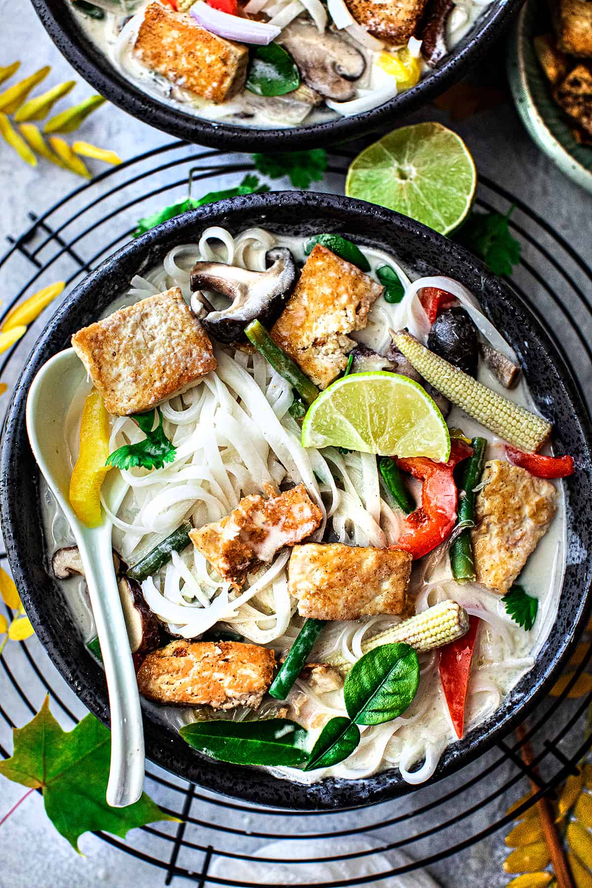 vegan tom kha soup recipe in a bowl. 