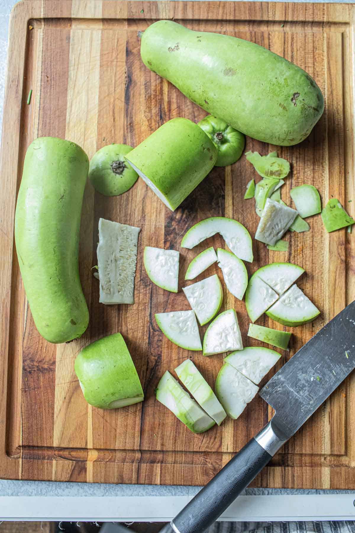 Sliced winter melon soup on a cutting board. 