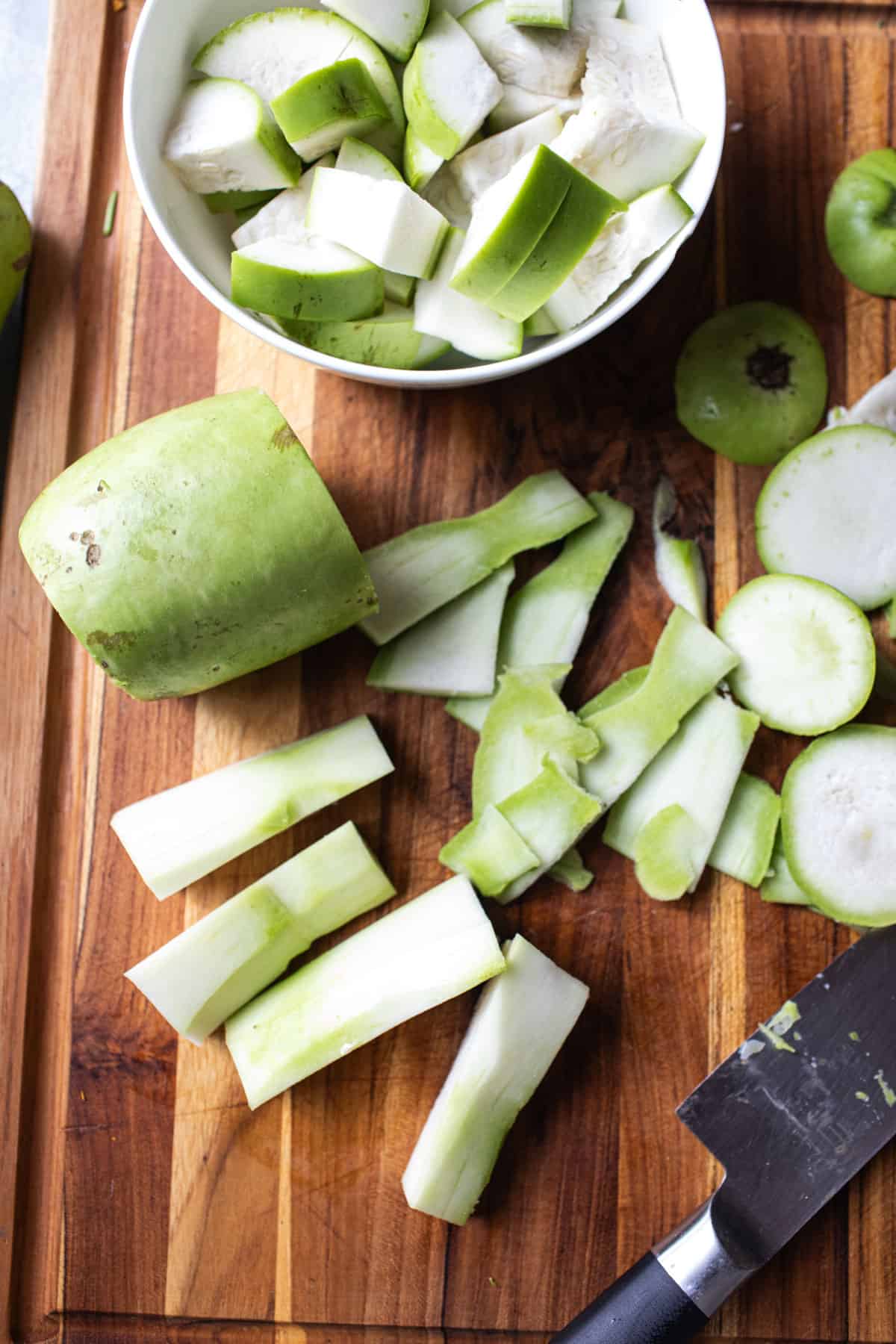 Chinese winter melons slices on the cutting board. 