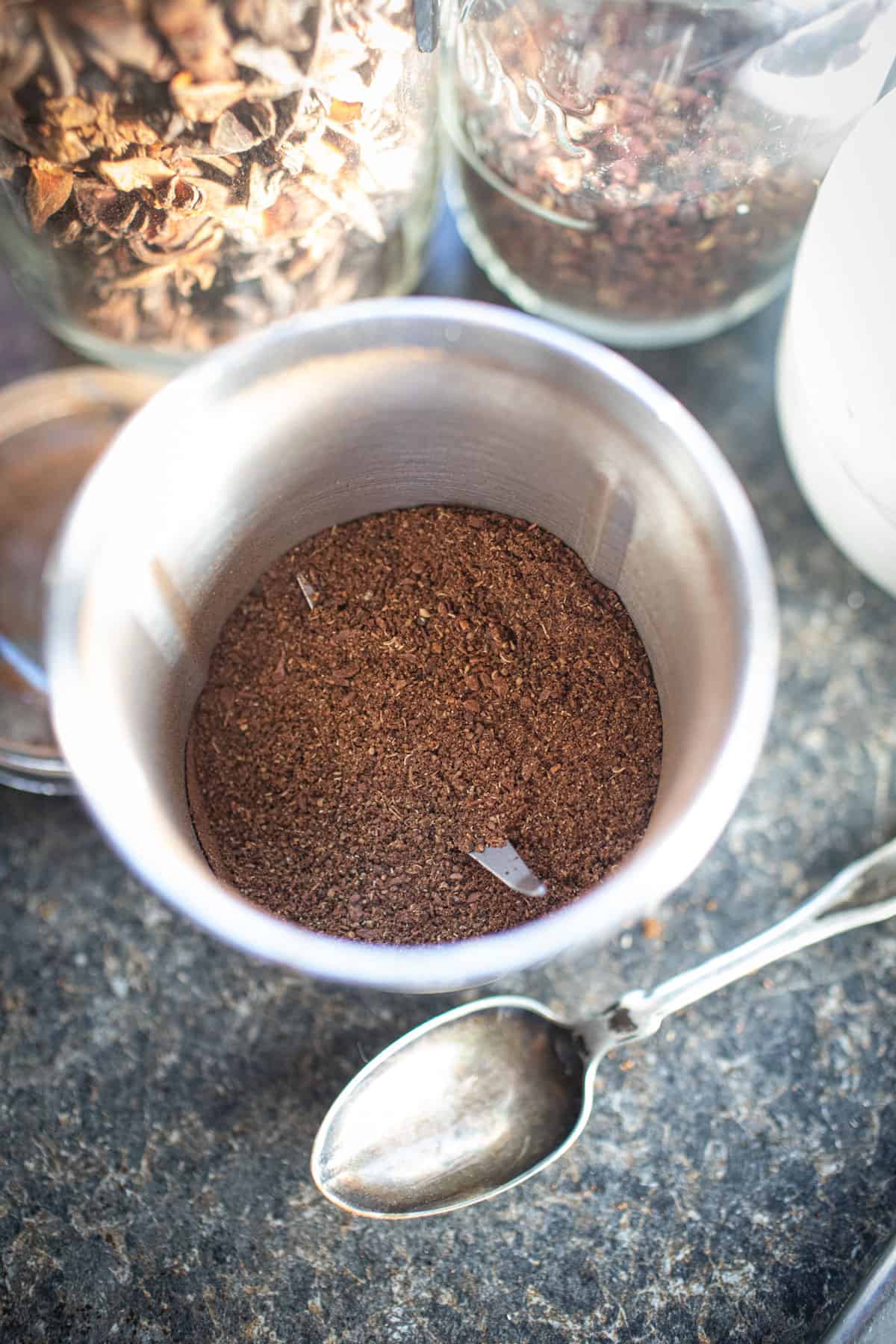 five spice powder in a grinder.