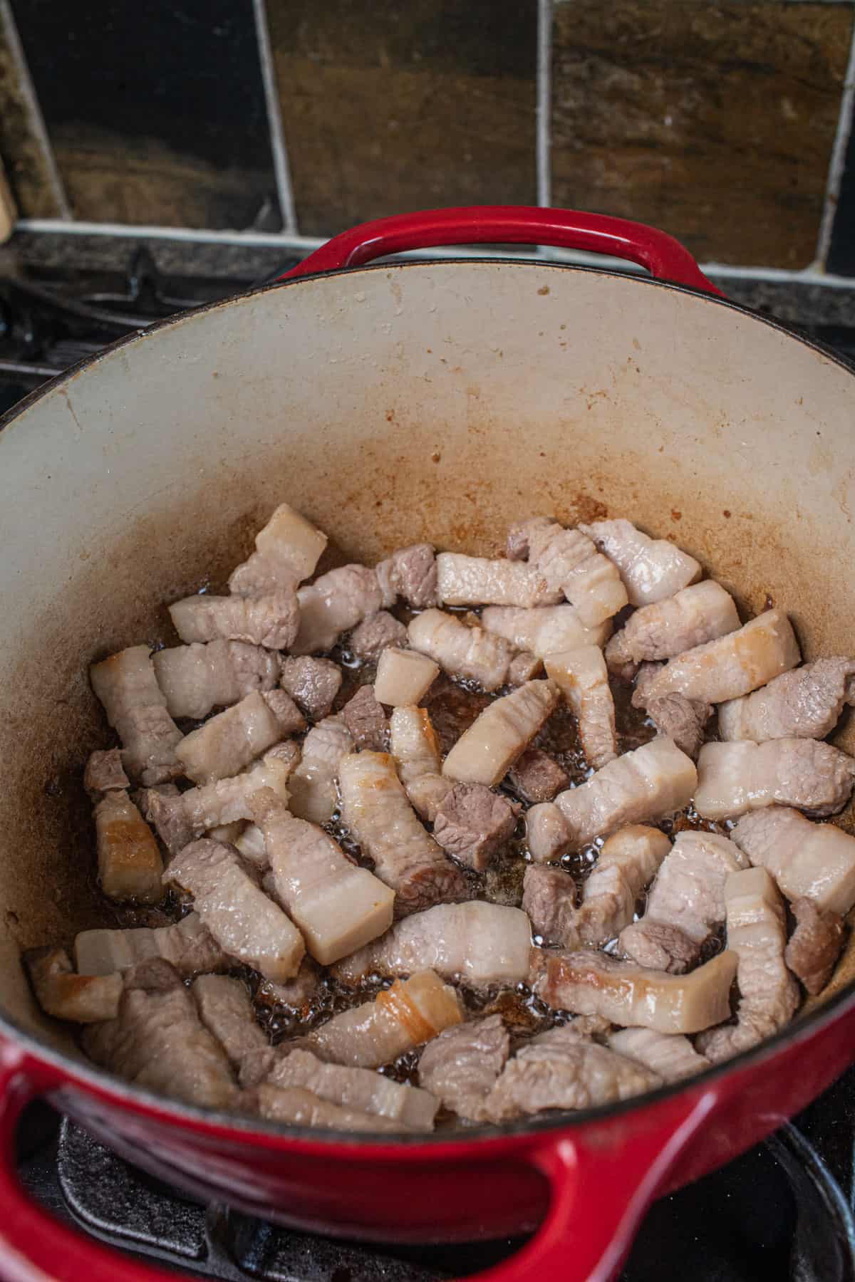 Pork belly in a dutch oven.