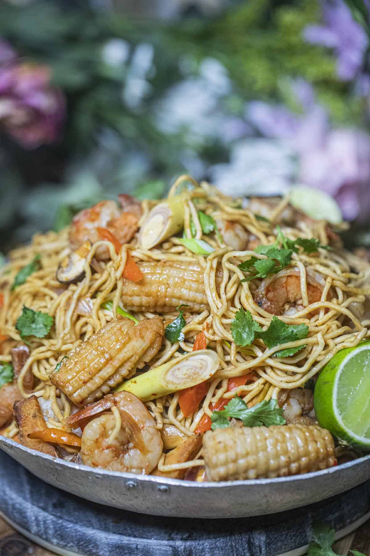 Tom Yum Noodles with seafood on a platter. 