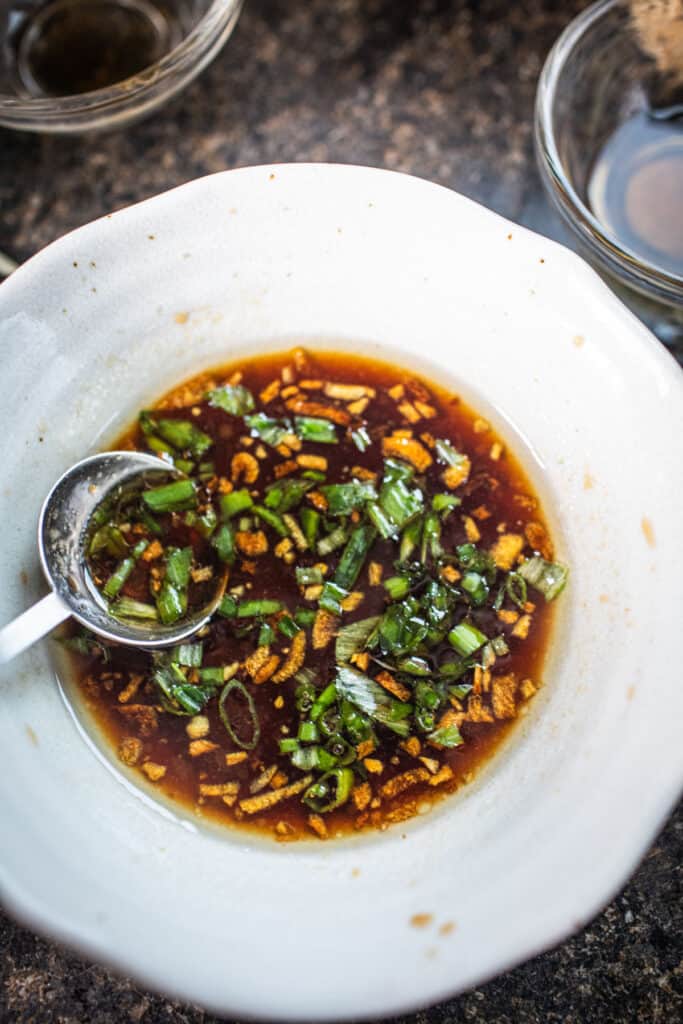 Thai Ba Mee hang sauce in a bowl. 