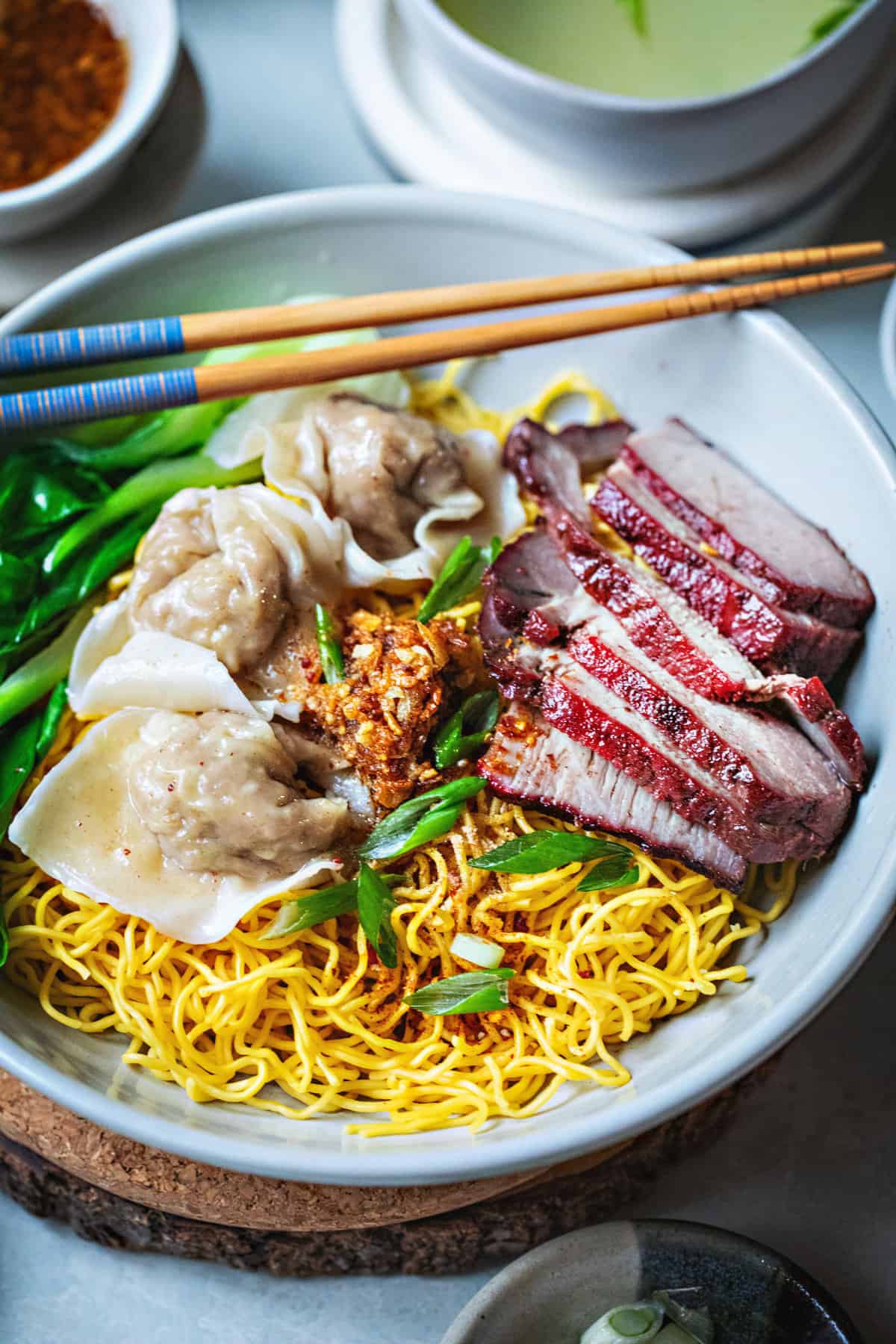 Ba Mee Moo Dang recipe in a bowl with pork and wonton.