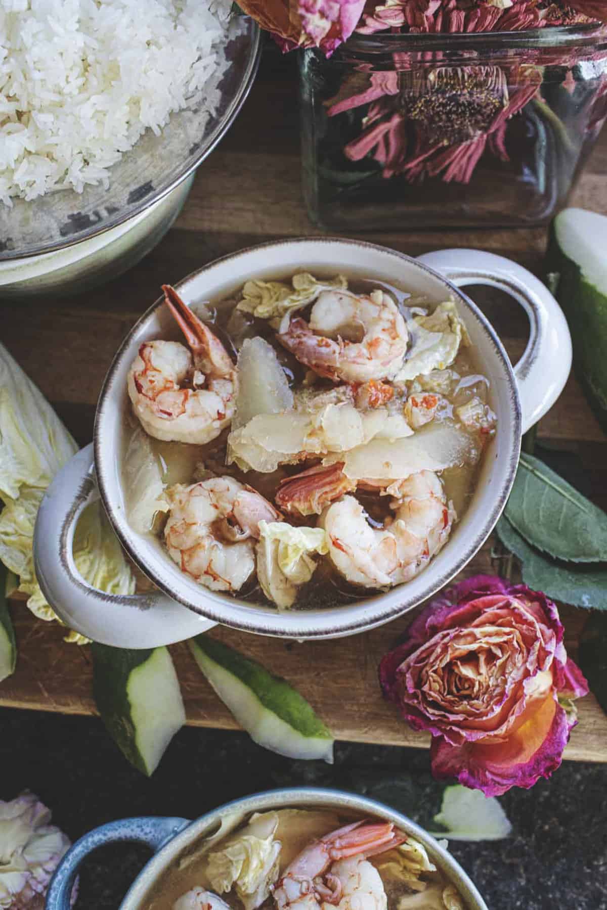 Thai green papaya curry in a bowl on the table. 