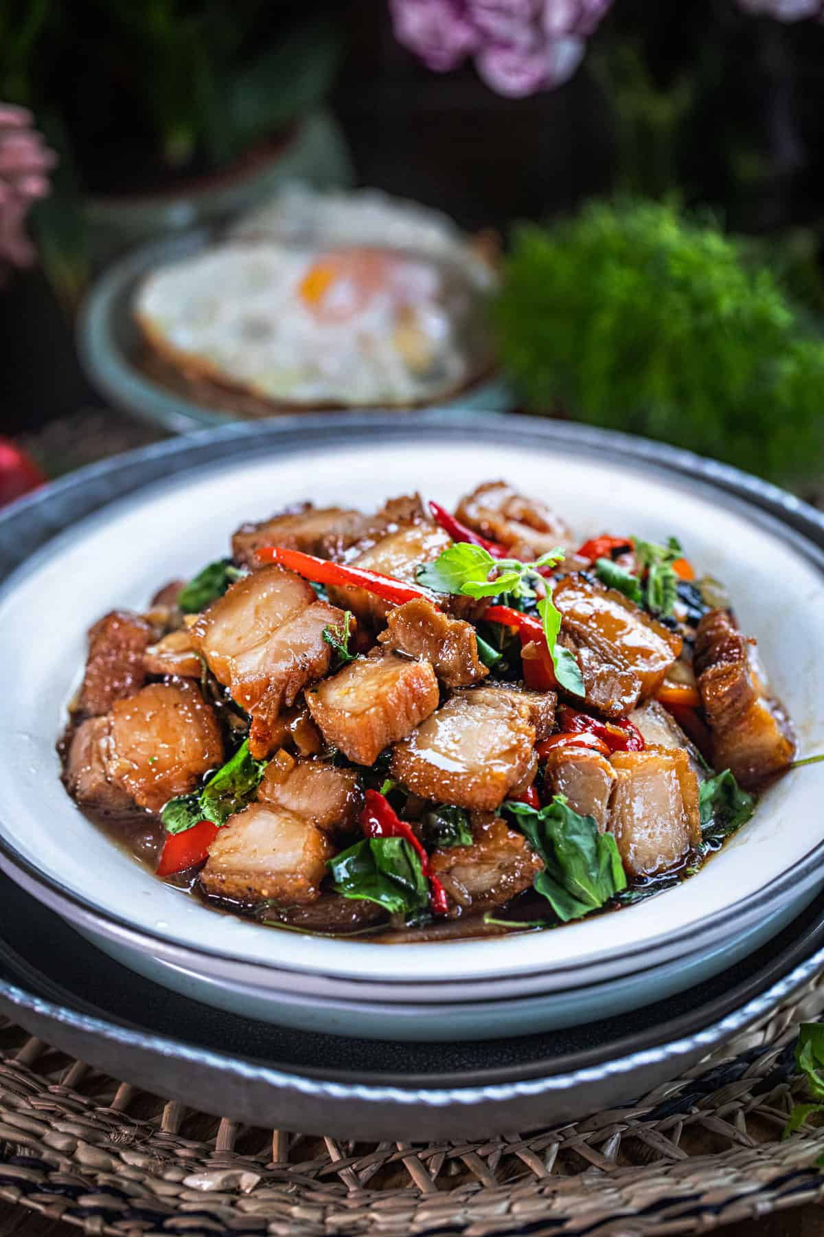 Thai basil pork belly stir fry on a plate. 