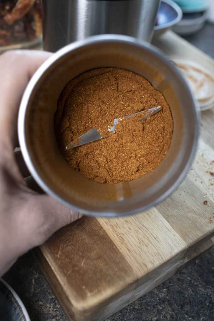 Thai pepper powder in a spice grinder. 