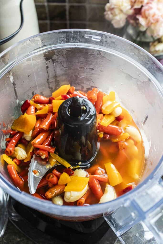 Thai hot sauce ingredients in a food processor.