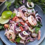 Thai Seafood salad on plate on the table.