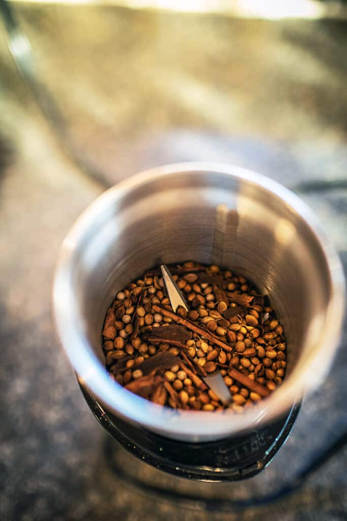 Spice seeds inside a spice grinder.