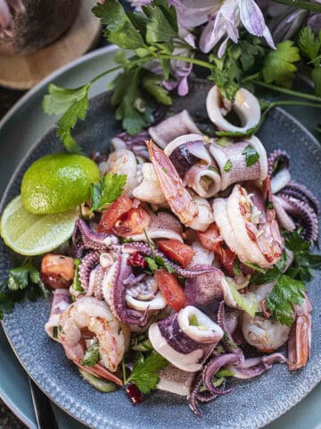 Thai seafood salad on a plate.