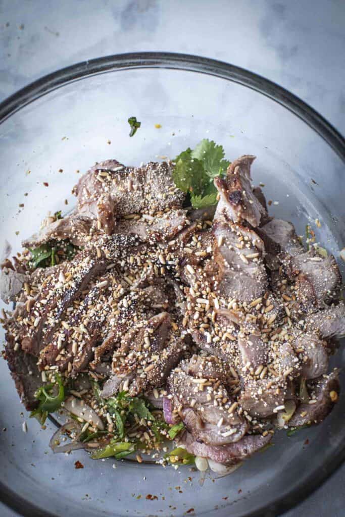 pork waterfall salad in a bowl.