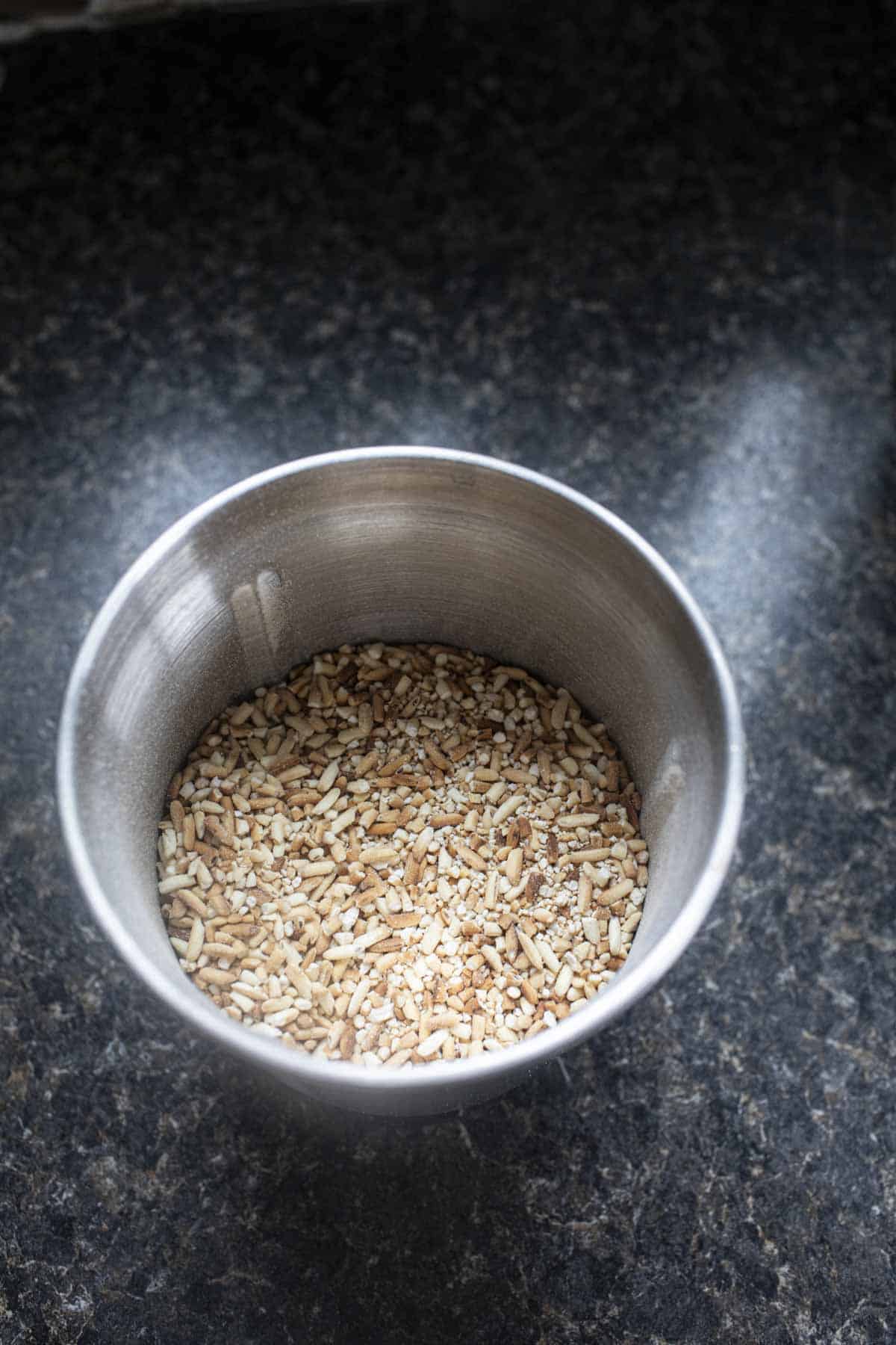 Roasted rice in a spice grinder. 