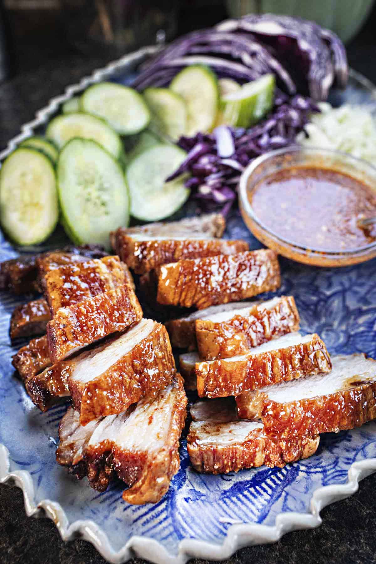 Pork belly slices on a tray. 