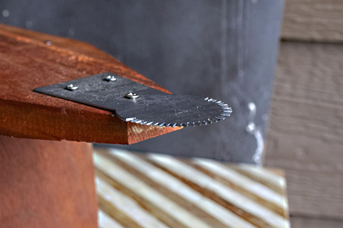 Close up of jaggery edges of Traditional Thai Coconut grater on a table. 