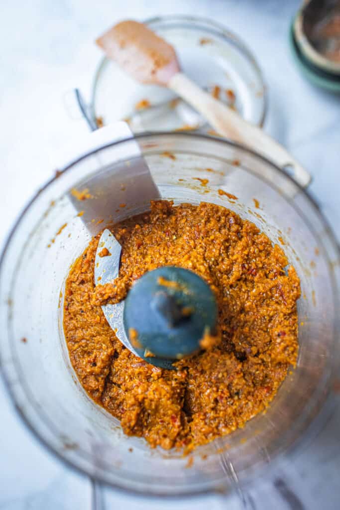 Homemade kao soi paste in a food processor. 