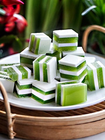 Pandan jelly cubes on a plate.