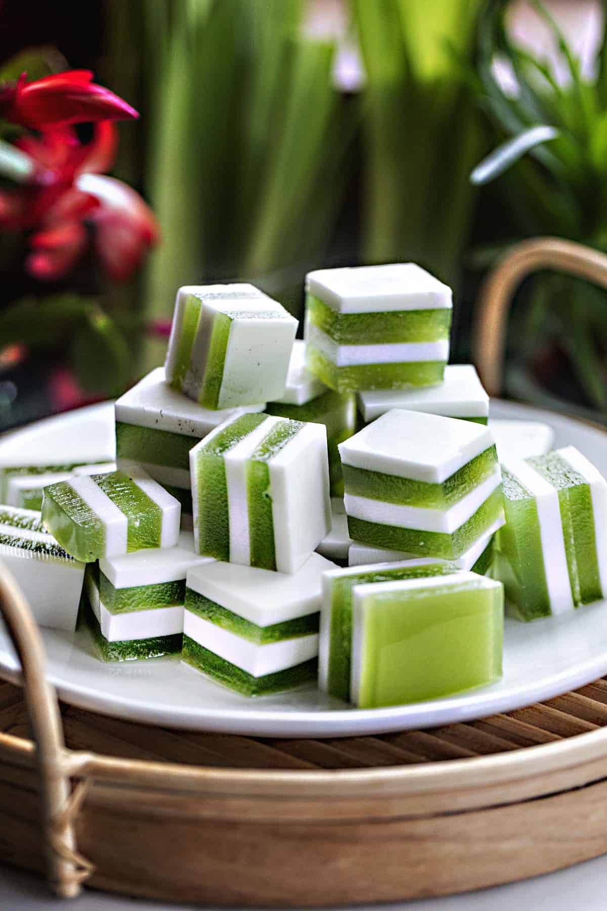 Thai pandan coconut jelly cubes on a table.